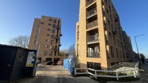 A builder’s collapse into administration has left hundreds of flats abandoned in a UK town, causing outrage.