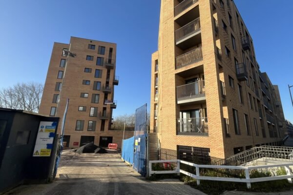 A builder’s collapse into administration has left hundreds of flats abandoned in a UK town, causing outrage.