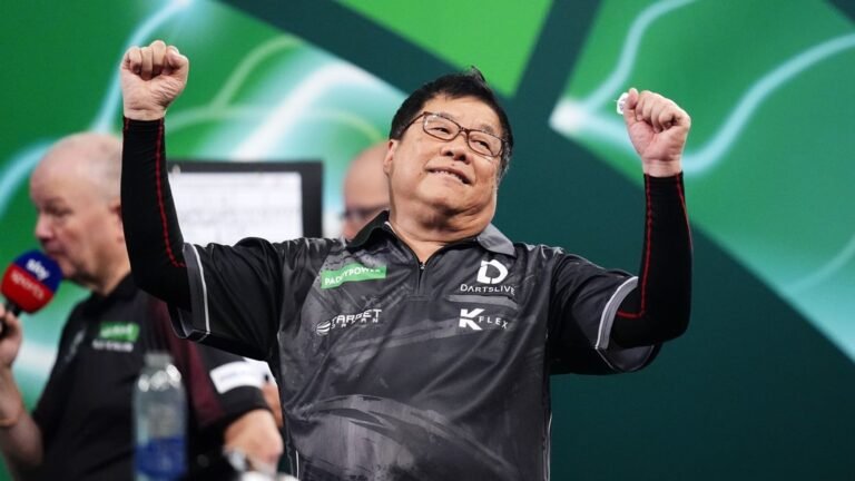 Paul Lim makes darts history as he becomes oldest player to win match at PDC World Championship | UK News