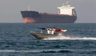 US naval ship patrolling the Strait of Hormuz as US-Iran tensions escalate in May 2026